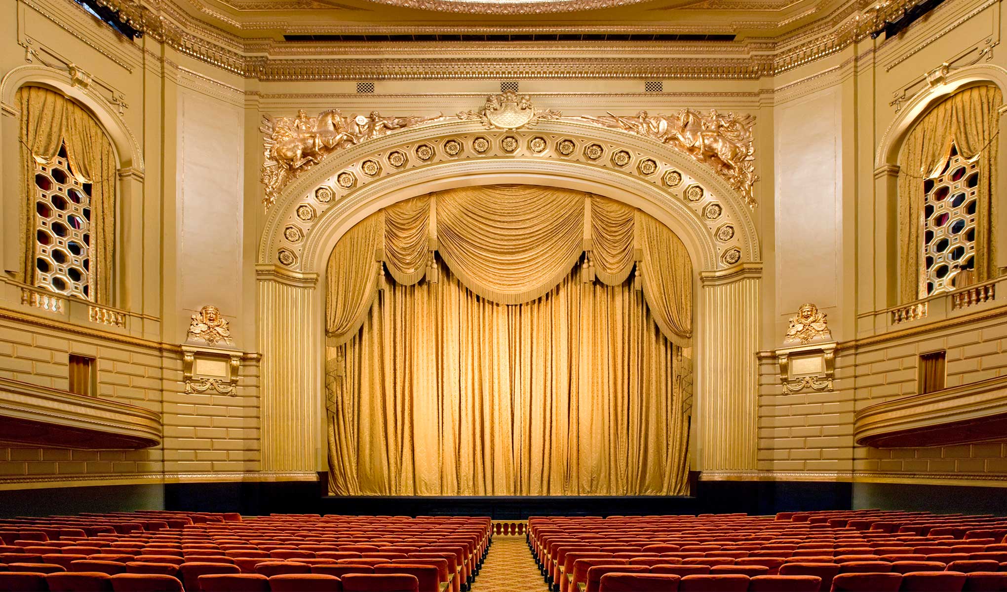 WMOH view of stage with gold curtains closed